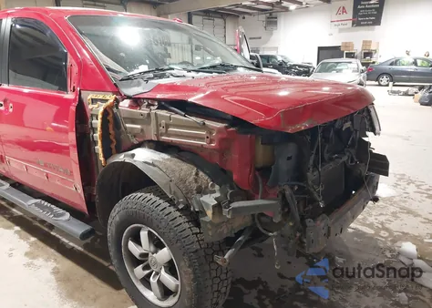 2012 Nissan Titan Pro-4X z USA, uszkodzony, nr VIN 1N6BA0ECXCN322271